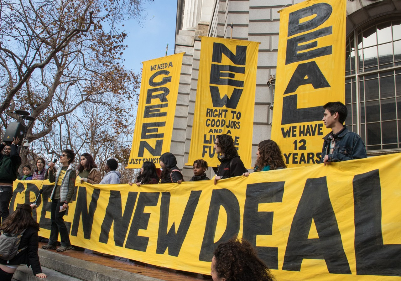 Organizers demonstrate for a Green New Deal